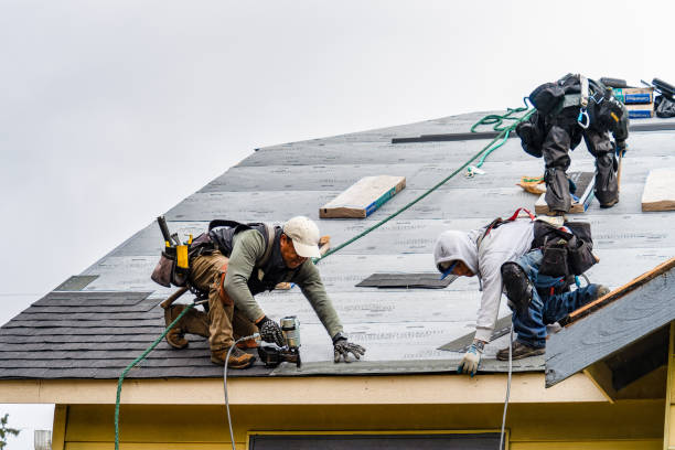 Professional Emergency Roof Repair technician working in Becket, MA
